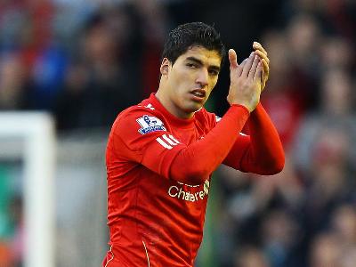 Arsenal increase Suarez offer